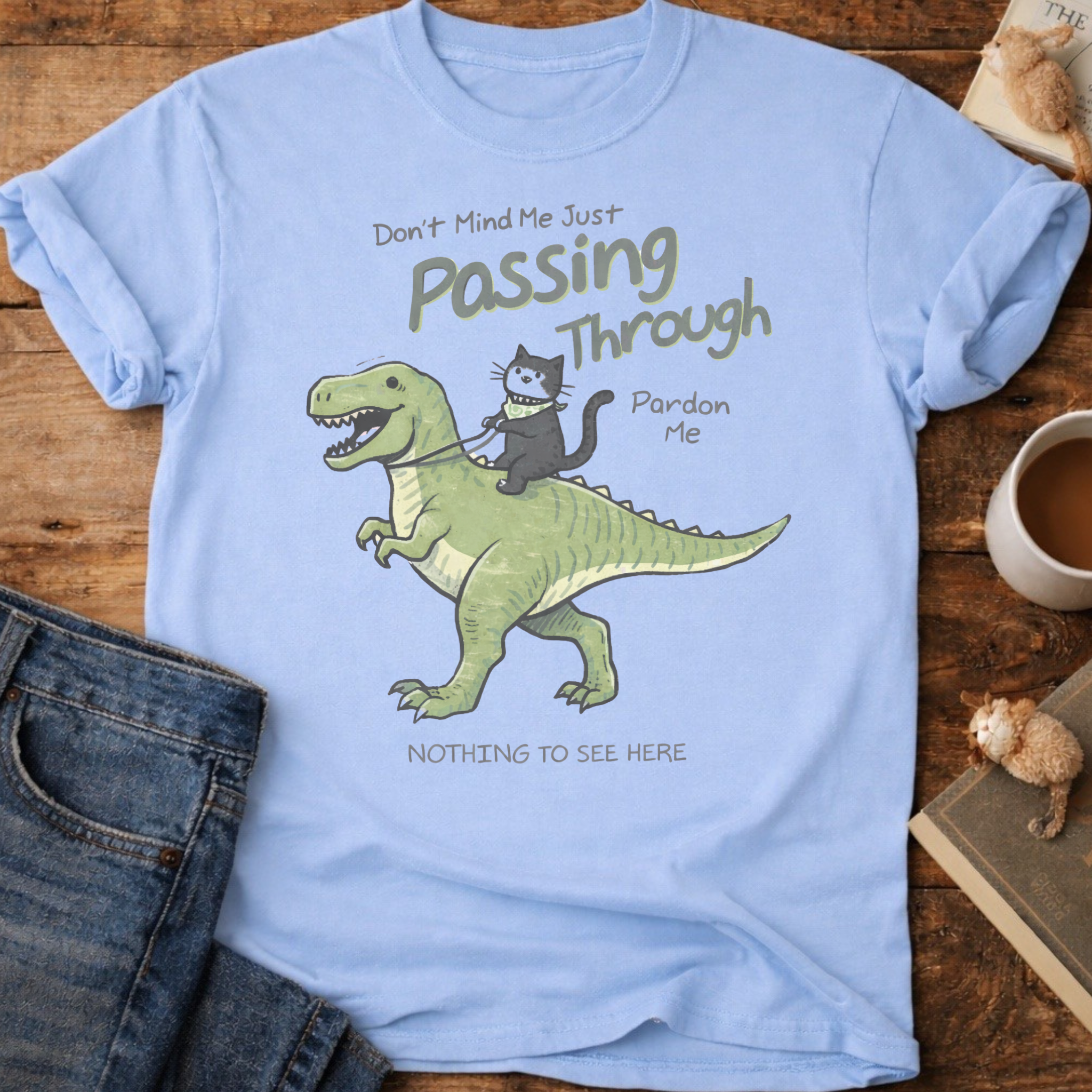 Cat Riding Dinosaur T‑Shirt