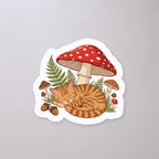 Mushroom Season Cat Sticker on a concrete floor