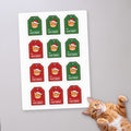 Personalized Cat Gift Tag Stickers, sticker sheet on a concrete floor (sample cat Mango)