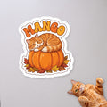 Personalized Pumpkin Spice Cat Sticker with a cat on a concrete floor (sample cat Mango)