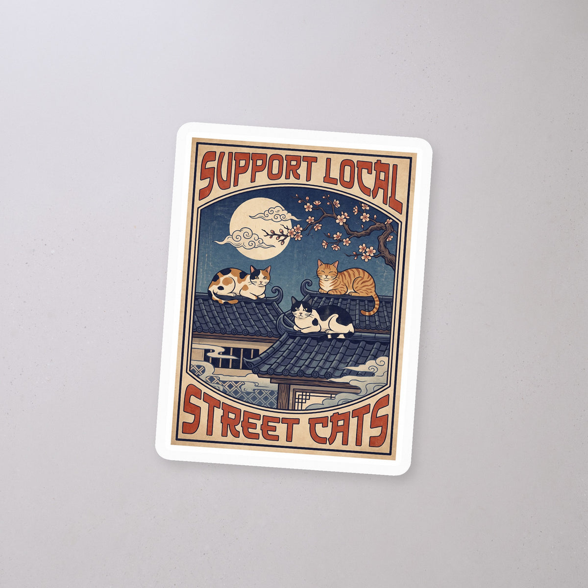 Support Local Street Cats Rooftop Print Sticker on a concrete floor